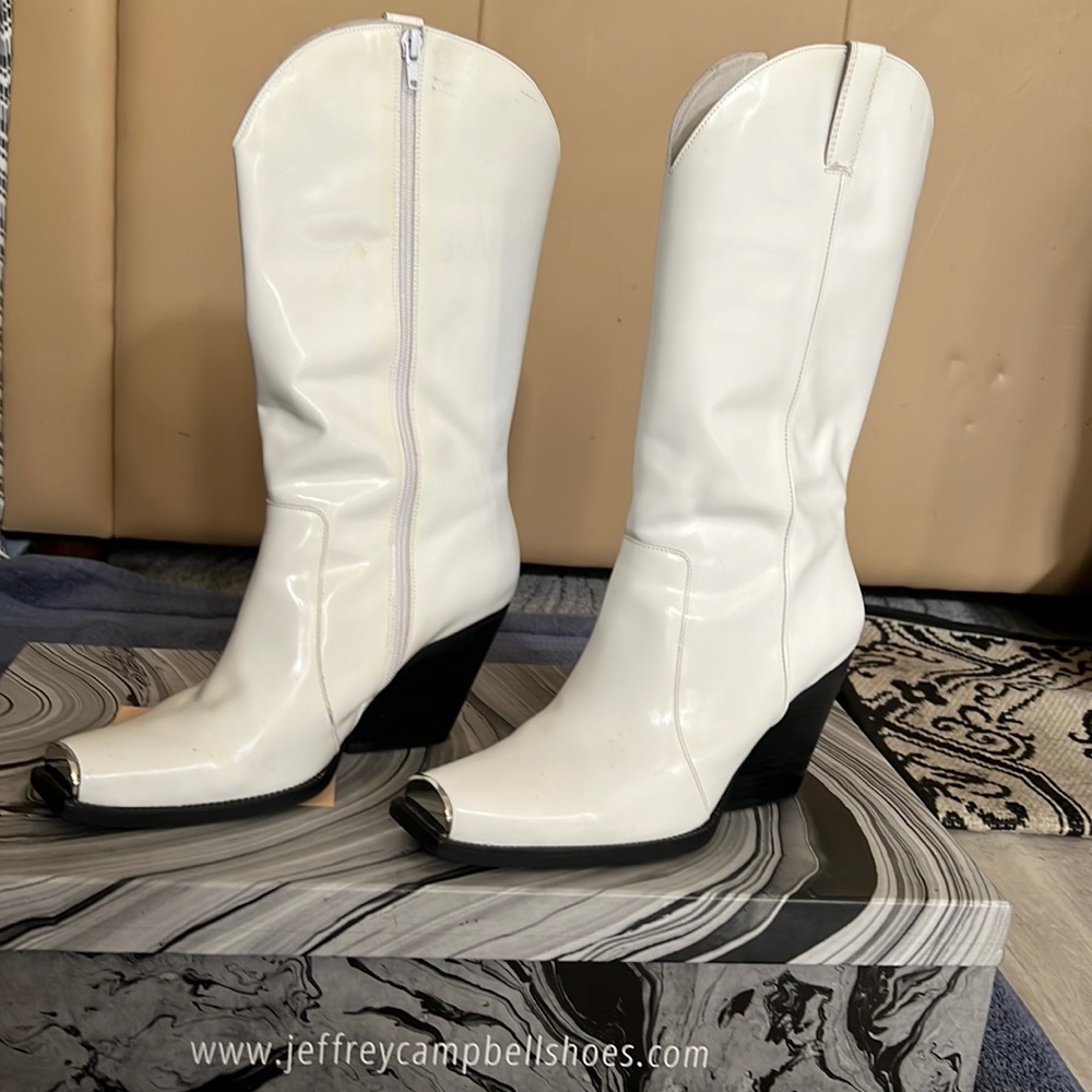 Jeffery Campbell white patten leather boots.